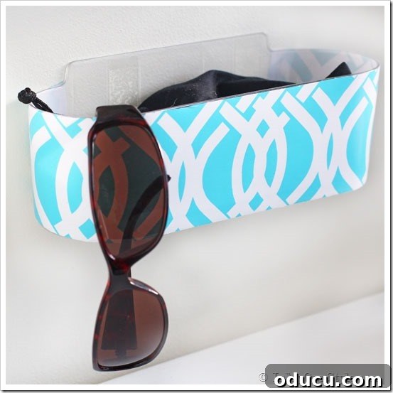Mudroom-Wall Organizing Ideas Mudroom wall organizing ideas, showing a clear Command Brand caddy with decorative paper insert for a personalized touch.