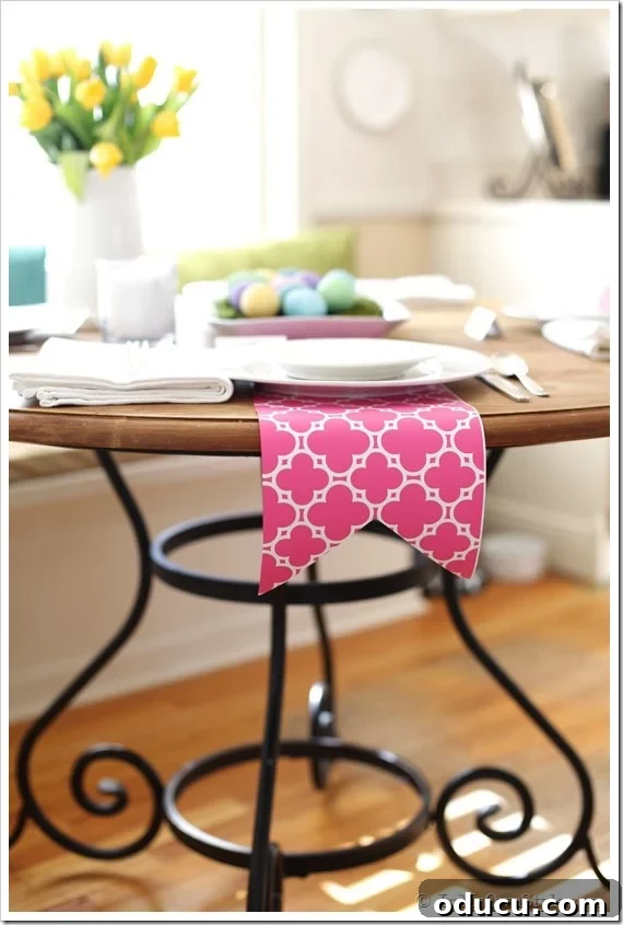 Innovative Decorating with Gift Wrap Creative decorating with gift wrap ideas, showcasing a vibrant pattern used as a table runner for holiday decor.