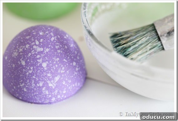 How to Paint Speckled Easter Eggs Guide Chalk painted speckled Easter eggs drying, showcasing the matte finish and beginning speckle texture for craft ideas.
