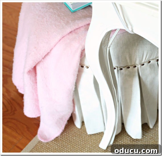 Clutter-Free Desk: DIY Cable Management 8 Plastic wire and cord clips holding a power cord securely along a desk leg
