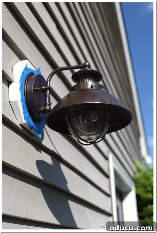How to paint outdoor light fixtures Outdoor light fixture taped and painted with fresh hammered finish paint