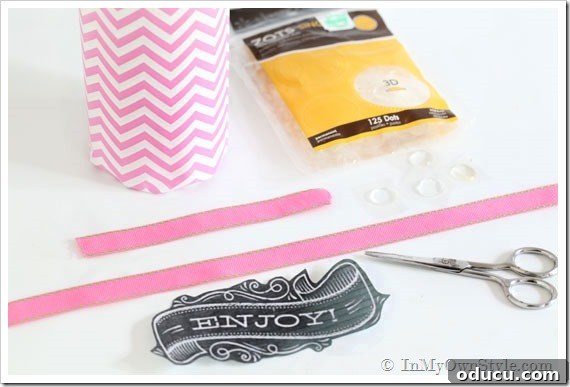 Creative Hostess Gift Wrapping for Wine Bottles Wine bottle with ribbon and a gift tag attached, showcasing a charming hostess gift idea.