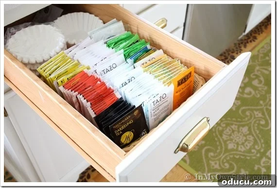 Organizing-Ideas-for-little-items Organizing teabags and coffee filters in drawer with a basket.