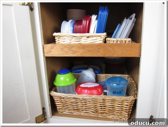 Kitchen Cabinet ORganizing Idea Kitchen Cabinet Organizing Idea showing small baskets hold plasticware.
