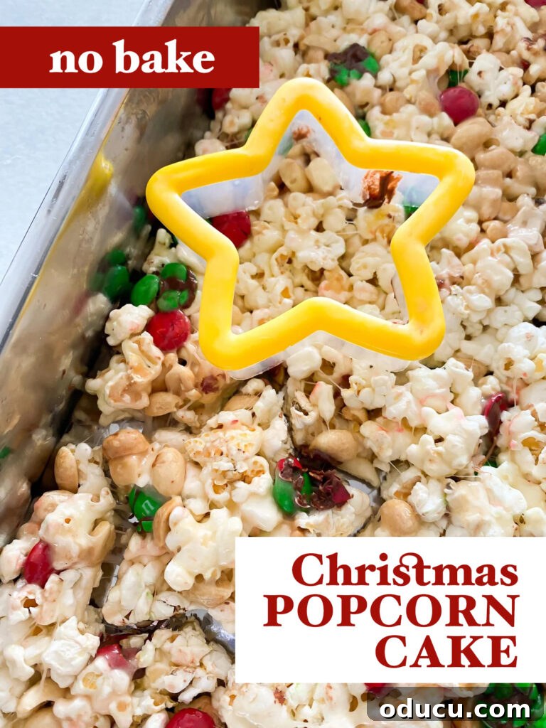 Festive Star Popcorn Cakes 10 A pan of no-bake Christmas Popcorn Cake with star shapes partially cut out and a cookie cutter resting nearby.