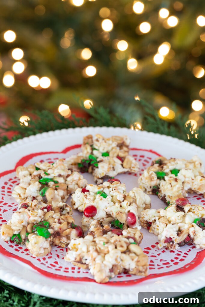 Festive Star Popcorn Cakes 7 A beautiful display of Christmas popcorn cake stars arranged neatly on a serving platter, ready for holiday guests.