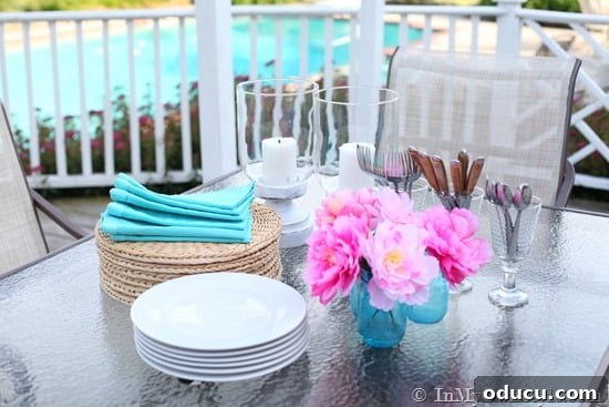 Thrifted Decorating Secrets Finding Your Home's Hidden Treasures 11 Thrift store candle vases painted white to use on outdoor table