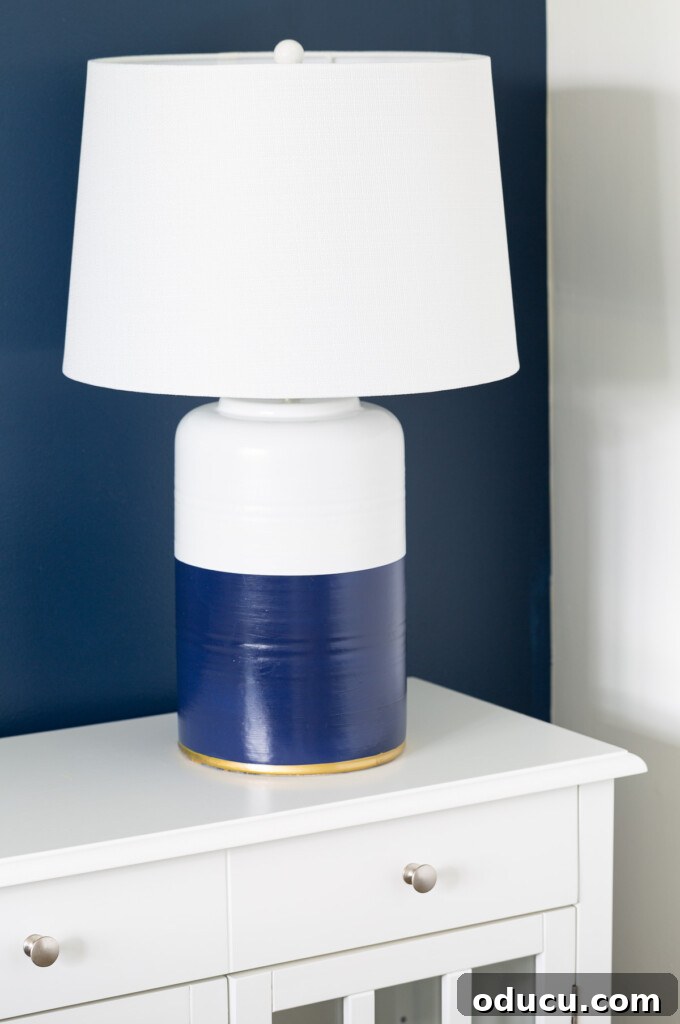 Thrifted Decorating Secrets Finding Your Home's Hidden Treasures 14 Serena and Lily copycat table lamp on white table.