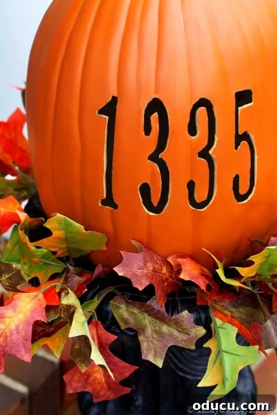 Carve a street address into a personalized foam pumpkin for elegant fall decoration. Custom foam pumpkin carved with a house street address, perfect for fall and Halloween porch decor.