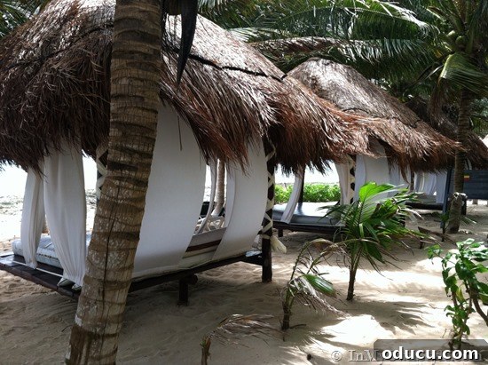 Comfortable Beach Huts in a Row Rows of charming beach huts providing shade and comfort along the coastline of El Dorado Royale.