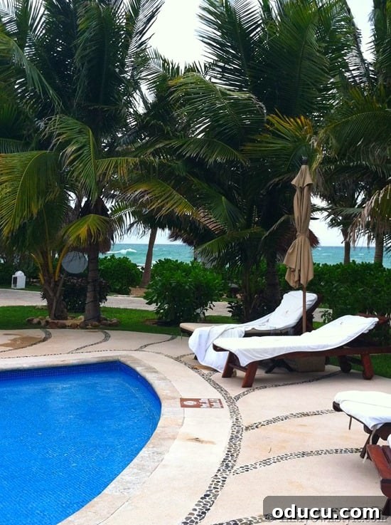 Tranquil Casitas Pool Area Serene pool area surrounded by casitas at El Dorado Royale, an ideal spot for relaxation and enjoyment.