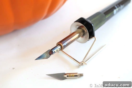 Hot knife tool specifically designed for carving foam, used for clean cuts.
