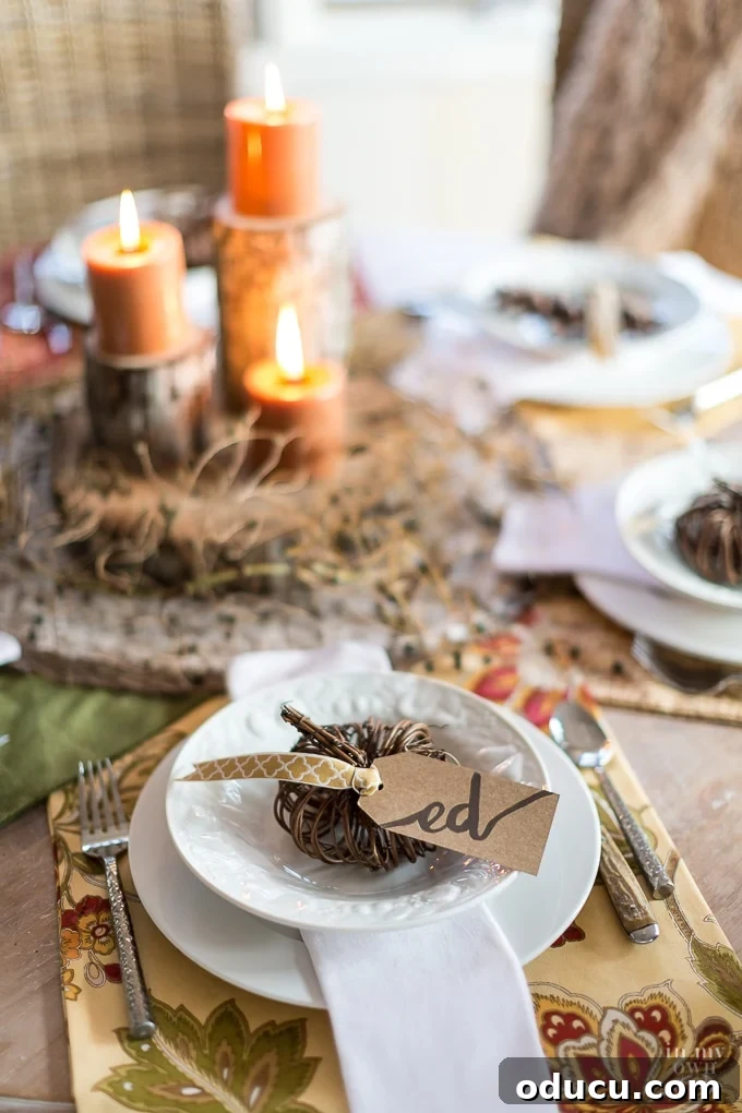 Thanksgiving Table Setting Ideas using pinecones and fabric for a budget-friendly festive look.
