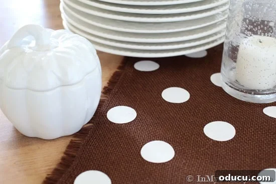 White polka dot on brown burlap fringed table runner, a chic DIY Thanksgiving table linen.