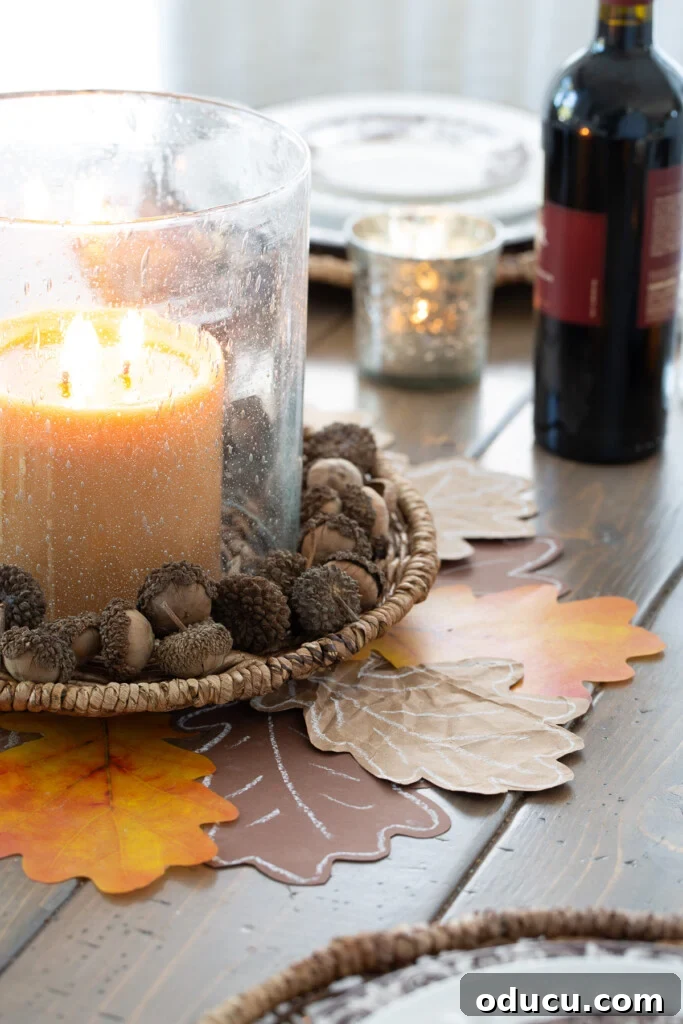 Cut out paper leaves made into a Thanksgiving table centerpiece, elegant and simple.