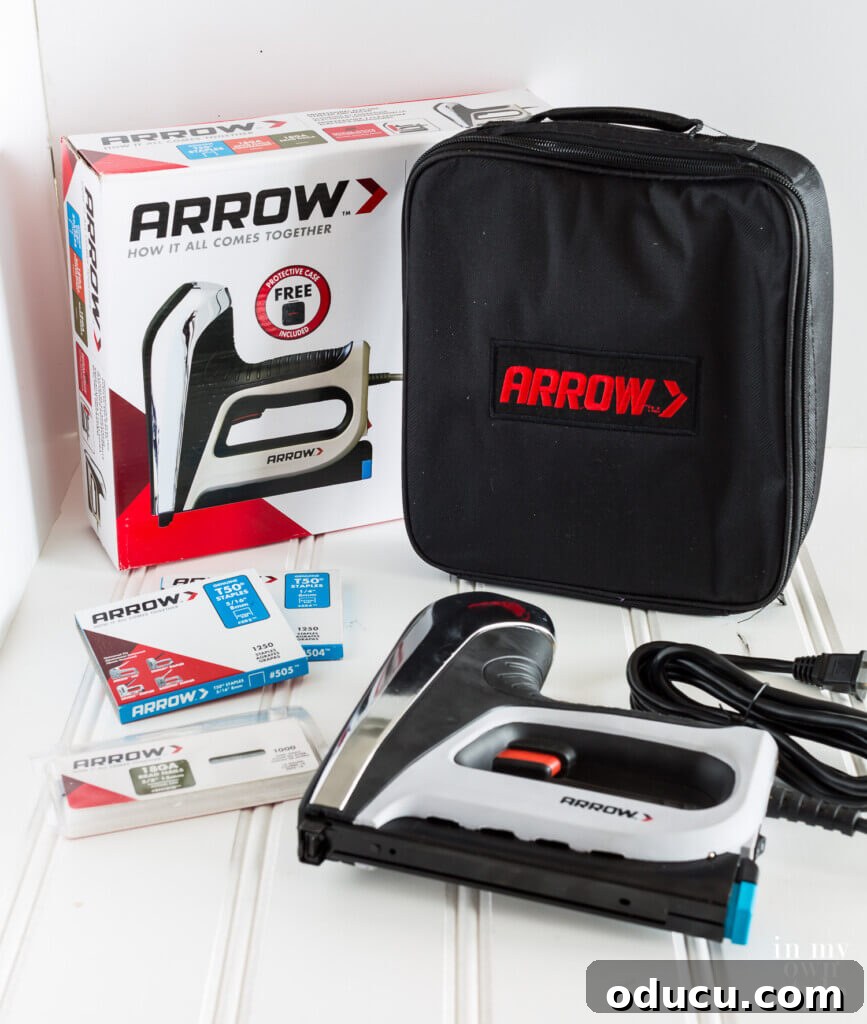 Upcycled Photo Frame Christmas Tree Skirt 19 The Arrow T50AC Staple gun box, staple gun, and its sturdy storing case are neatly displayed, showcasing a reliable tool for DIY enthusiasts.
