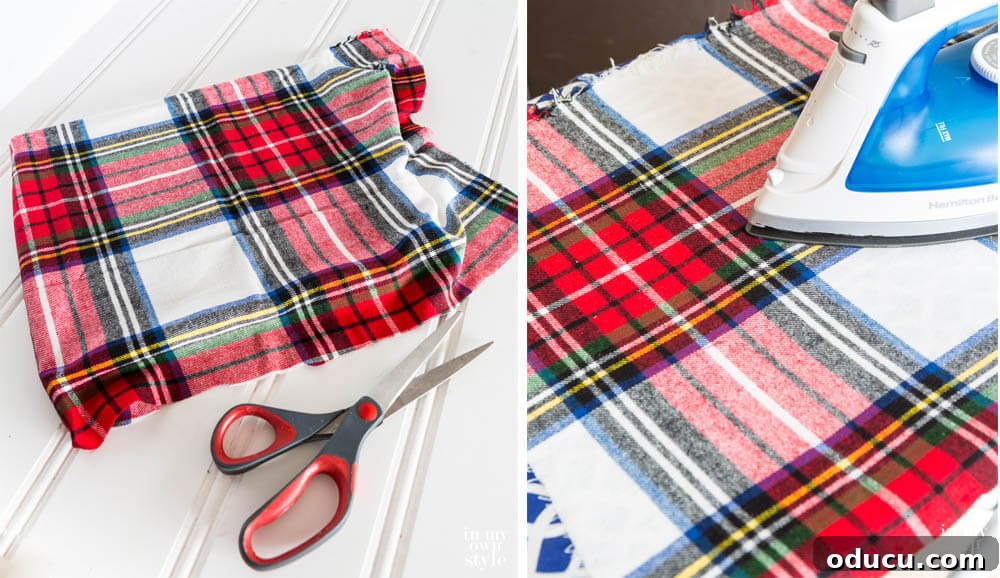 Upcycled Photo Frame Christmas Tree Skirt 6 Image showing how to carefully wrap fabric around photo frames and press it with an iron to ensure a smooth, wrinkle-free surface before stapling, highlighting proper fabric preparation.