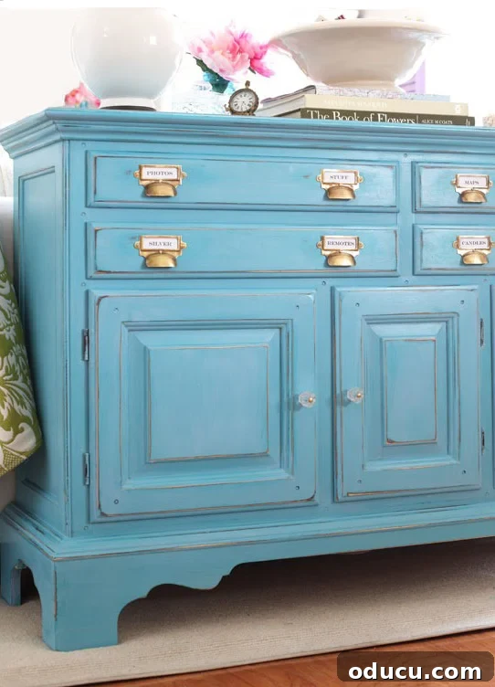 DIY-Chalk-Painted-Furniture-recipes A beautiful turquoise sideboard that has been chalk painted using a DIY calcium carbonate powder recipe.