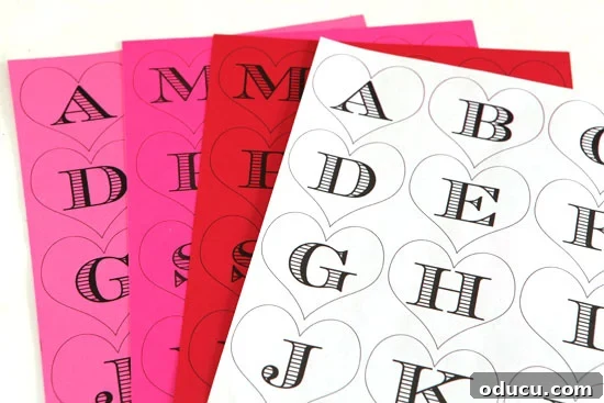 Heartfelt Initial Crafts: Free Valentine Printables 4 Free printable Valentine heart initial gift tags, featuring various letters, perfect for personalizing gifts and decor.