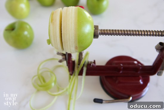 Step-by-step guide on how to core and slice an apple for baking.