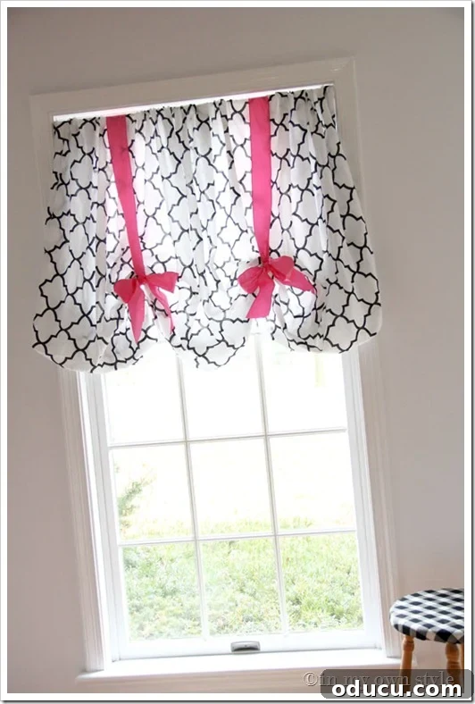 Ribbon Flair for Instant Home Style 16 Balloon style window treatment on a window created using a fitted sheet and ribbon, a simple no-sew solution.