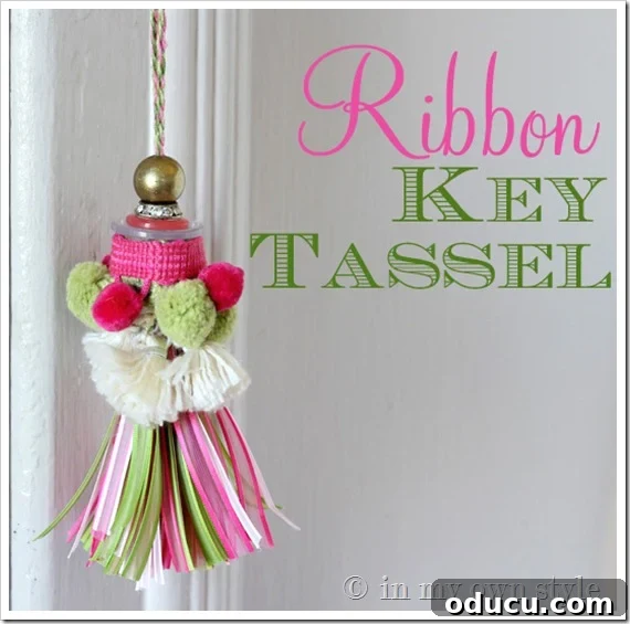 Ribbon Flair for Instant Home Style 6 Key tassel made using pink and green ribbons hanging from a lock on a door, a creative use of ribbon scraps.