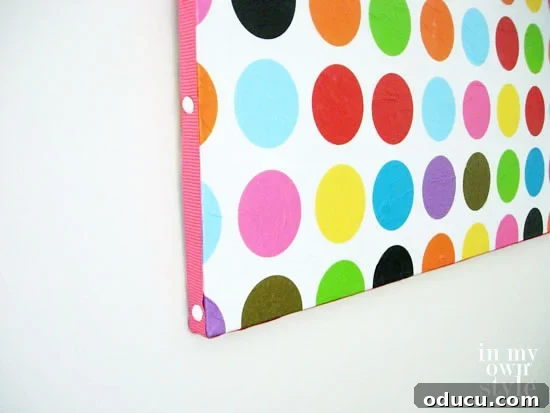 Ribbon Flair for Instant Home Style 9 Circle printed tissue paper covered canvas with ribbon trim around the outer edges, providing a budget-friendly framing alternative.