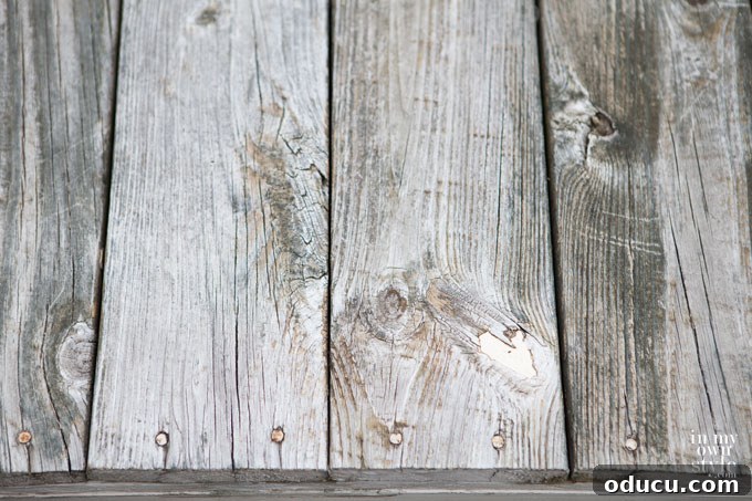Deck Restore Fail Far From Brand New 2 Deck-boards-up-close-before-using-Rustoleum-Concrete-and-Deck-Restore