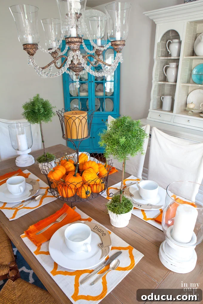 Printable Banner Dinner Place Cards 8 Affordable Fall entertaining table setting ideas that include a free printable for you to make paper ribbon banner dinner plate place cards