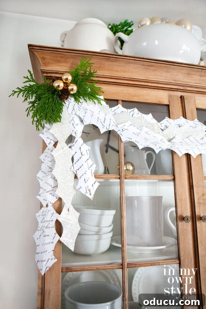 DIY Holly Leaf Christmas Garland 20 Paper Crafts for the holidays: DIY Christmas Garland Ideas with free printable leaf pattern
