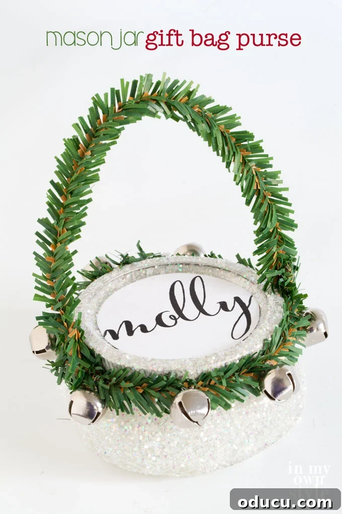 A Mason jar transformed into a cute and pretty gift handbag, ideal for women and girls, with garland ties as handles.