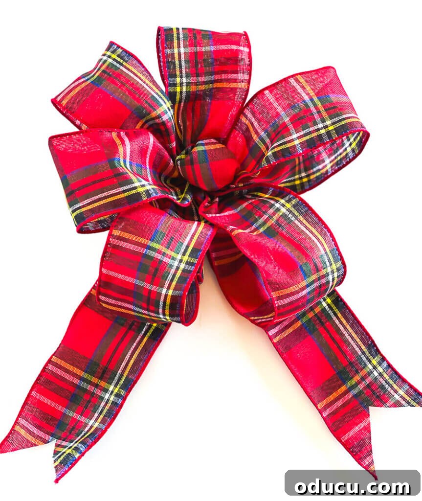 Mastering Ribbon Bows: Simple Steps for Gifts, Wreaths, and Decor 24 How to Make a Bow For a Wreath. Red plaid multi loop bow with looped ribbon center.
