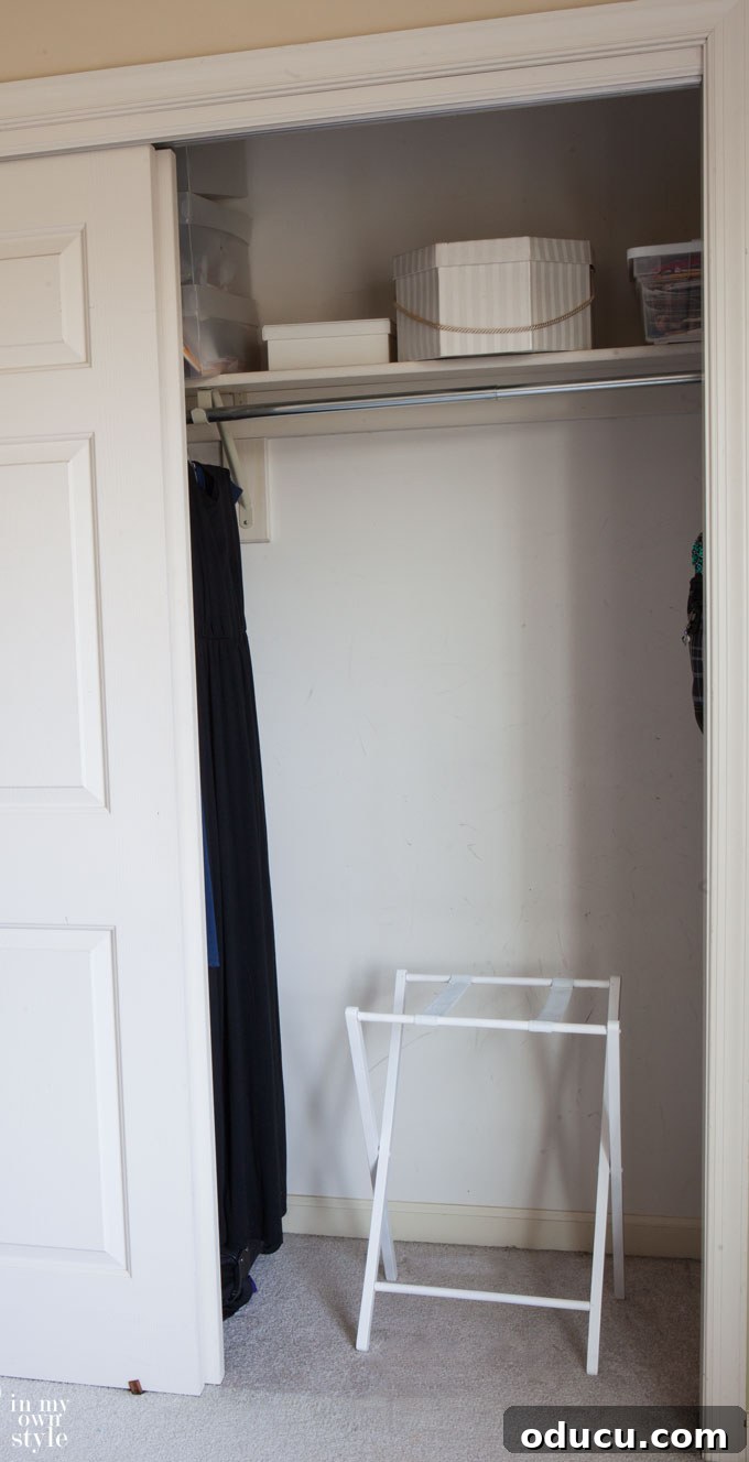 Your Welcome Space Awaits 4 Entertaining-overnight-guests - A neatly organized guest room with a luggage rack