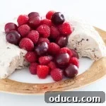 Christmas Semifreddo with berries, elegantly presented on a plate