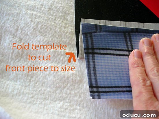 slipcover-how-to-template-3 How to make a pattern to make a back slipcover for a chair. Demonstrating the utility of cardboard templates for consistency and ease in cutting fabric.