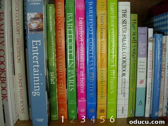 Ina-Garten-Cookbooks-in-my- A collection of Ina Garten's iconic cookbooks, showcasing her brand and aesthetic.