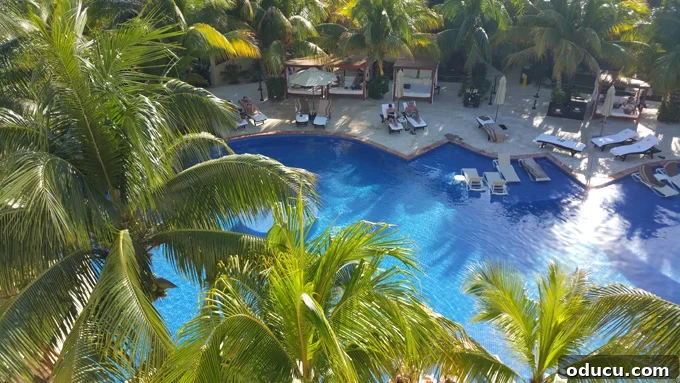 El Dorado Maroma: Your Ultimate Mexican Paradise 4 Sparkling pool area at the El Dorado Maroma resort on the Riviera Maya, inviting guests to relax and refresh