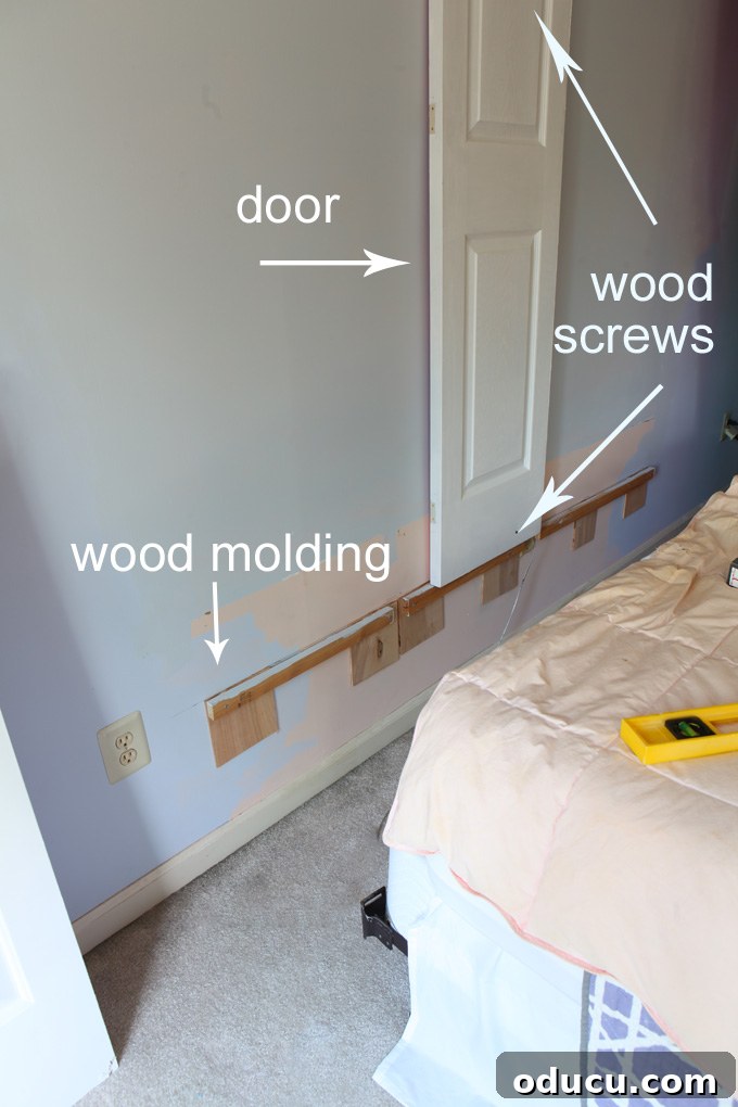 How-to-attach-old-doors-to-a-wall-to-make-a-headboard