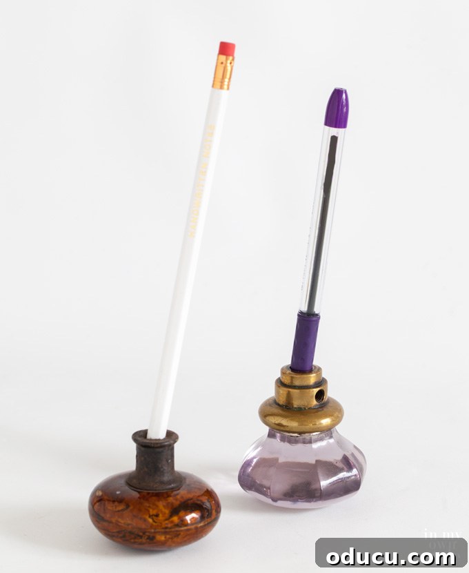 Knob Appeal: Designing for Your Feed 2 Collection of repurposed doorknobs serving as unique pen and pencil holders, highlighting upcycled home office accessories.