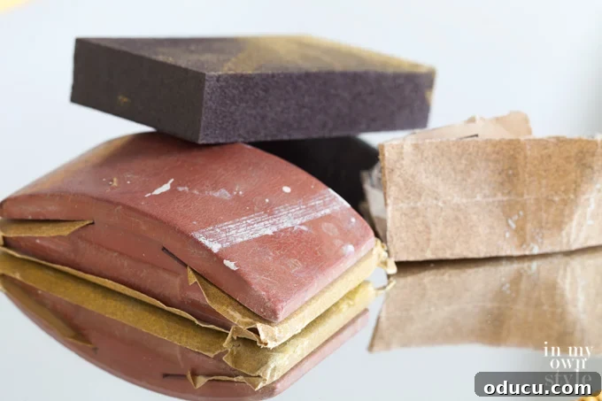 Craft Your Own Chalk Paint from Acrylics 4 How to distress furniture using sandpaper and sanding blocks.