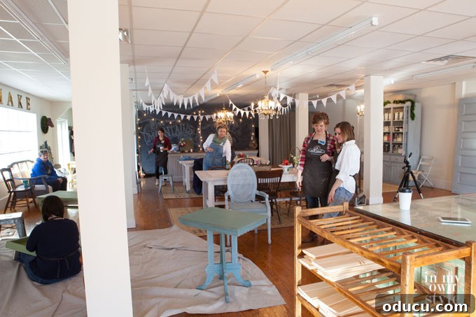 Transform Your Furniture with Miss Mustard Seed Milk Paint 2 Miss Mustard Seed's studio bustling with participants during a milk painting workshop
