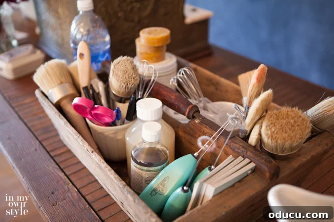 Transform Your Furniture with Miss Mustard Seed Milk Paint 4 Essential milk paint supplies laid out for a furniture painting workshop, including brushes and waxes