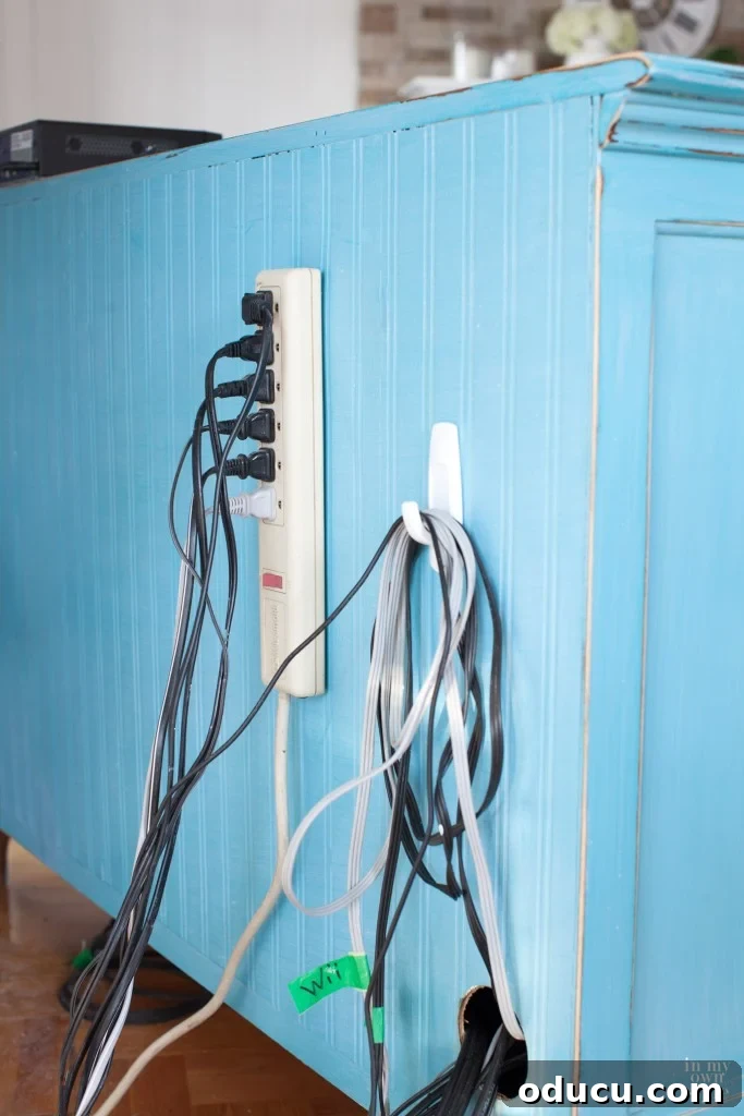 Invisible Wires: The Secret to a Sleek Wall-Mounted TV 5 How to organize TV cords so they are hidden