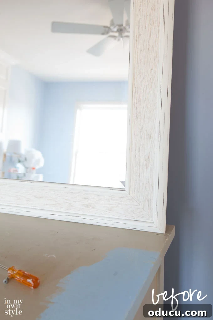 Premier Glossy White Paints 5 Bedroom mirror before painting for a high-gloss finish