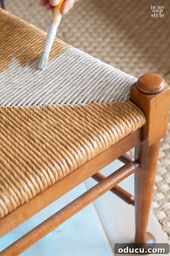 Applying stain to rush seat chairs for a driftwood finish, step-by-step.