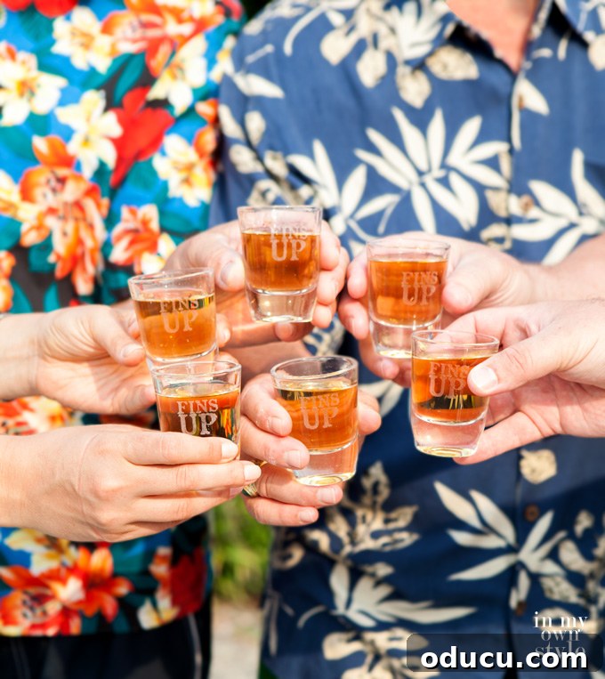 Crafting the Perfect Margarita 5 The Margaritaville shot glass tray displayed with filled shot glasses, ready for an outdoor party.