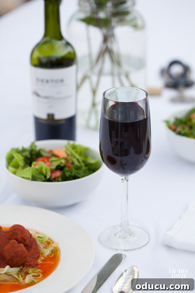 Outdoor Dining Done Right 9 outdoor alfresco meal with wine in acrylic glasses on a deck