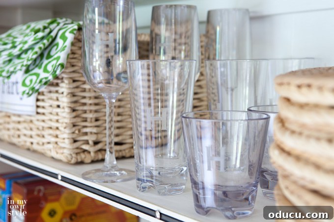 Outdoor Dining Done Right 6 monogrammed outdoor drinkware and glasses on a small table