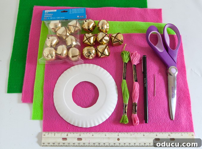 Christmas Door Knob Jingle 2 Essential crafting supplies for making a jingle bell door hanger, including felt, bells, and embroidery floss.