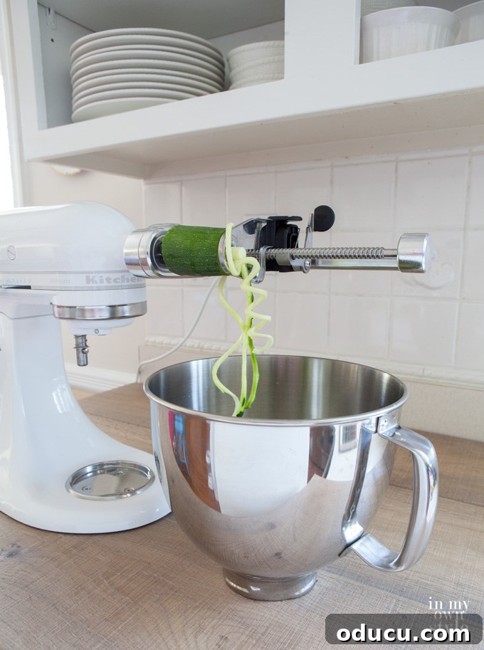 Close-up of the versatile KitchenAid Spiralizer attachment for stand mixers